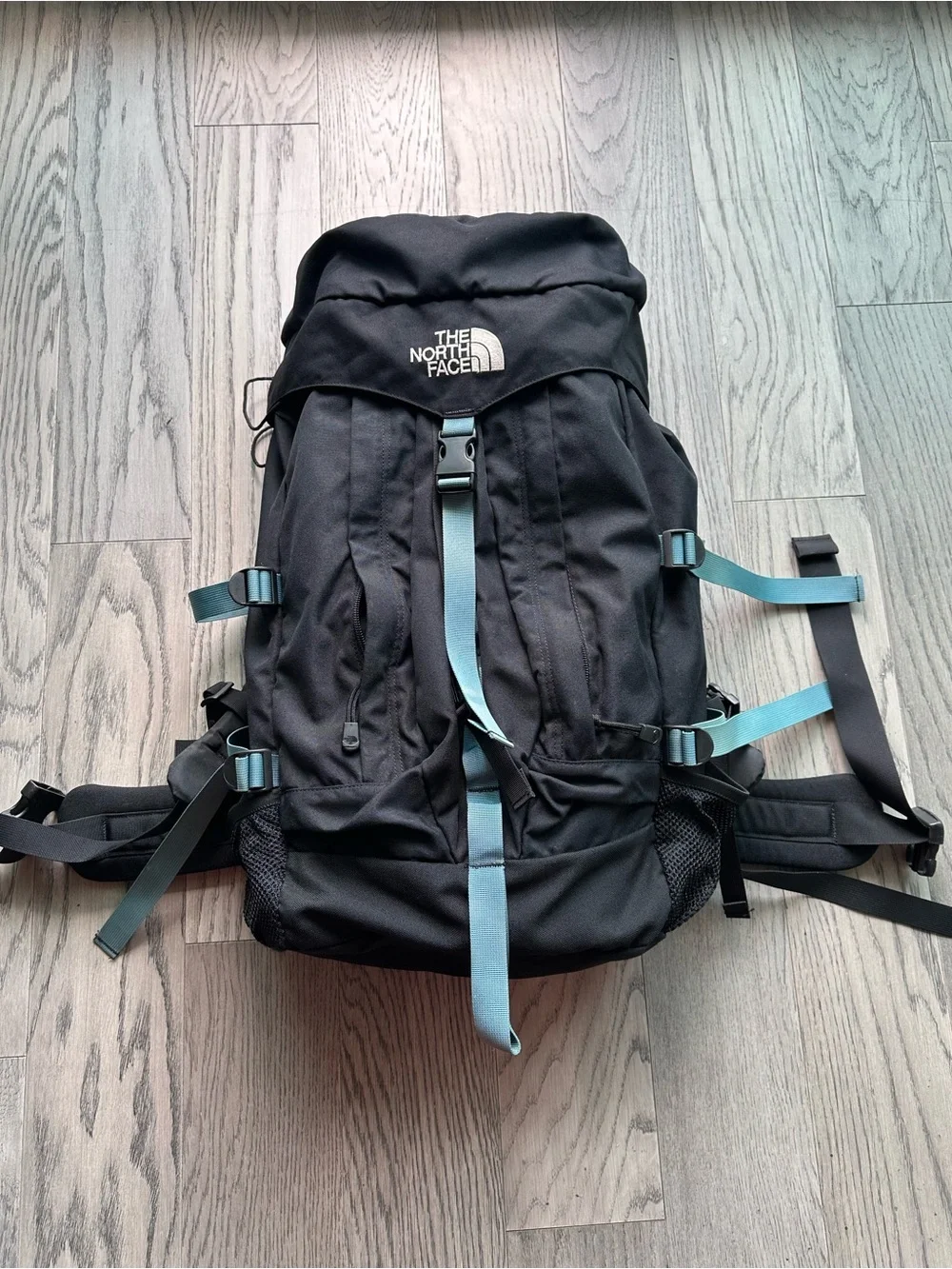 The North Face Large Hiking Backpack with Teal Straps